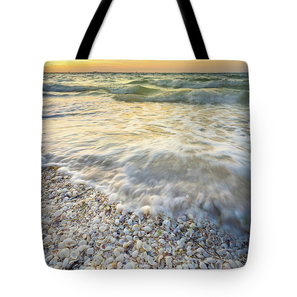 Seashells Tote Bag featuring the photograph Sunrise With Seashells by Jordan Hill
