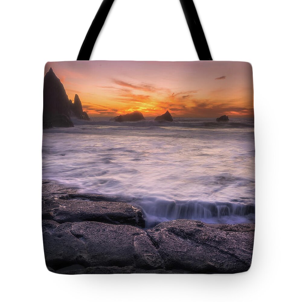 Color Tote Bag featuring the photograph Sunset at the Rock by Laura Macky