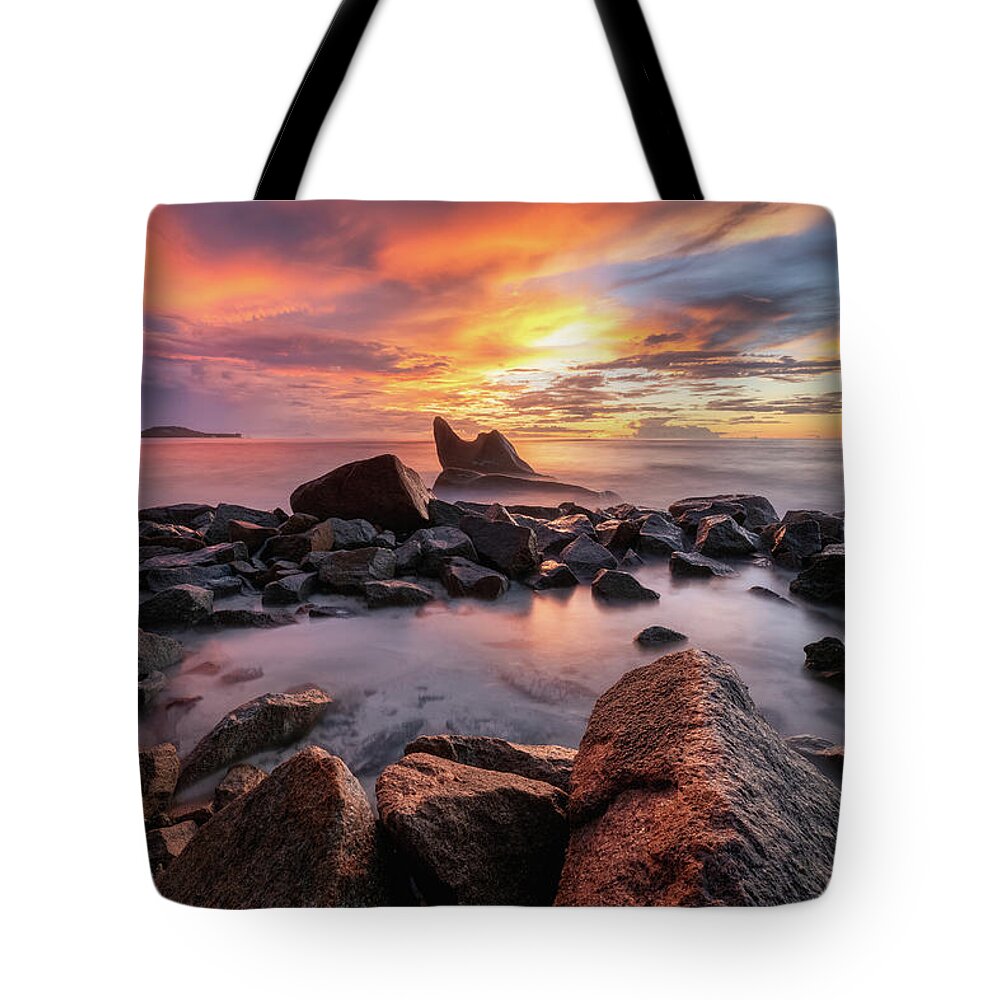 Rocks Tote Bag featuring the photograph Sunset beach by Erika Valkovicova