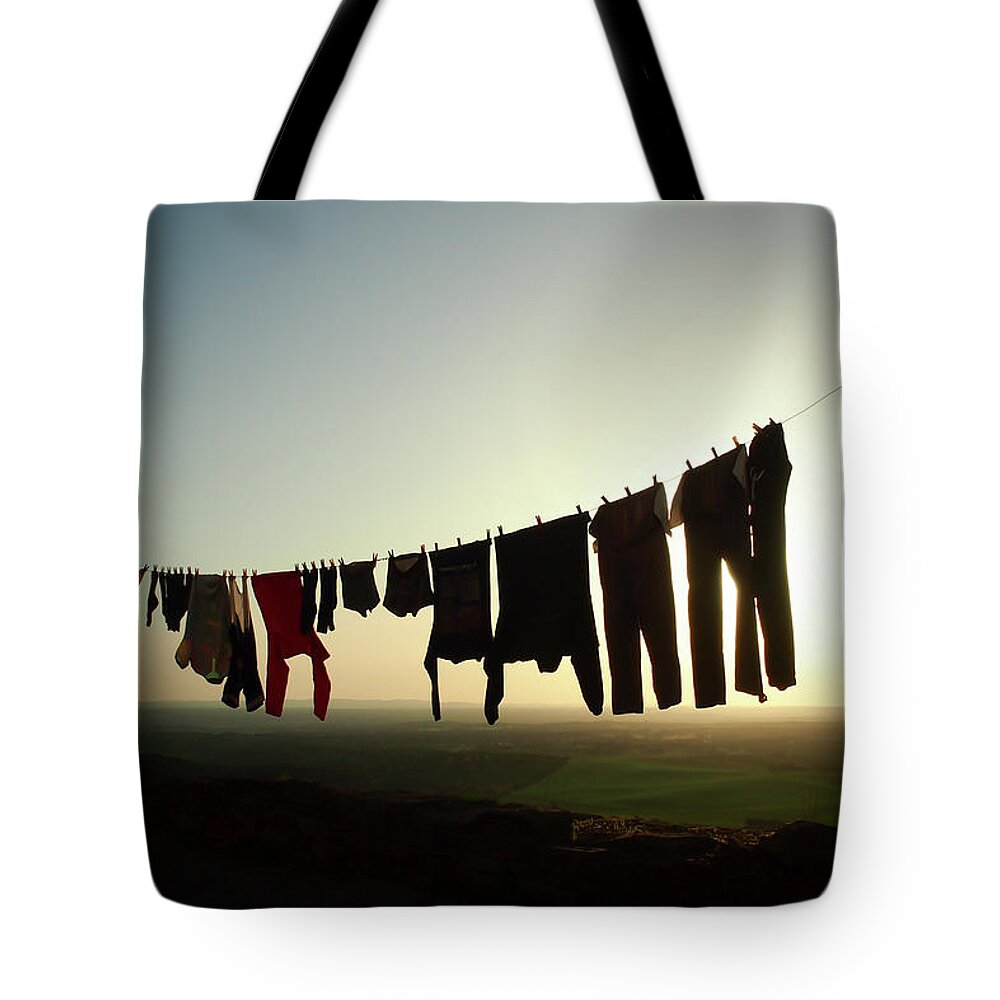 Sunset Tote Bag featuring the photograph Sunset Clothesline by Louise Tanguay