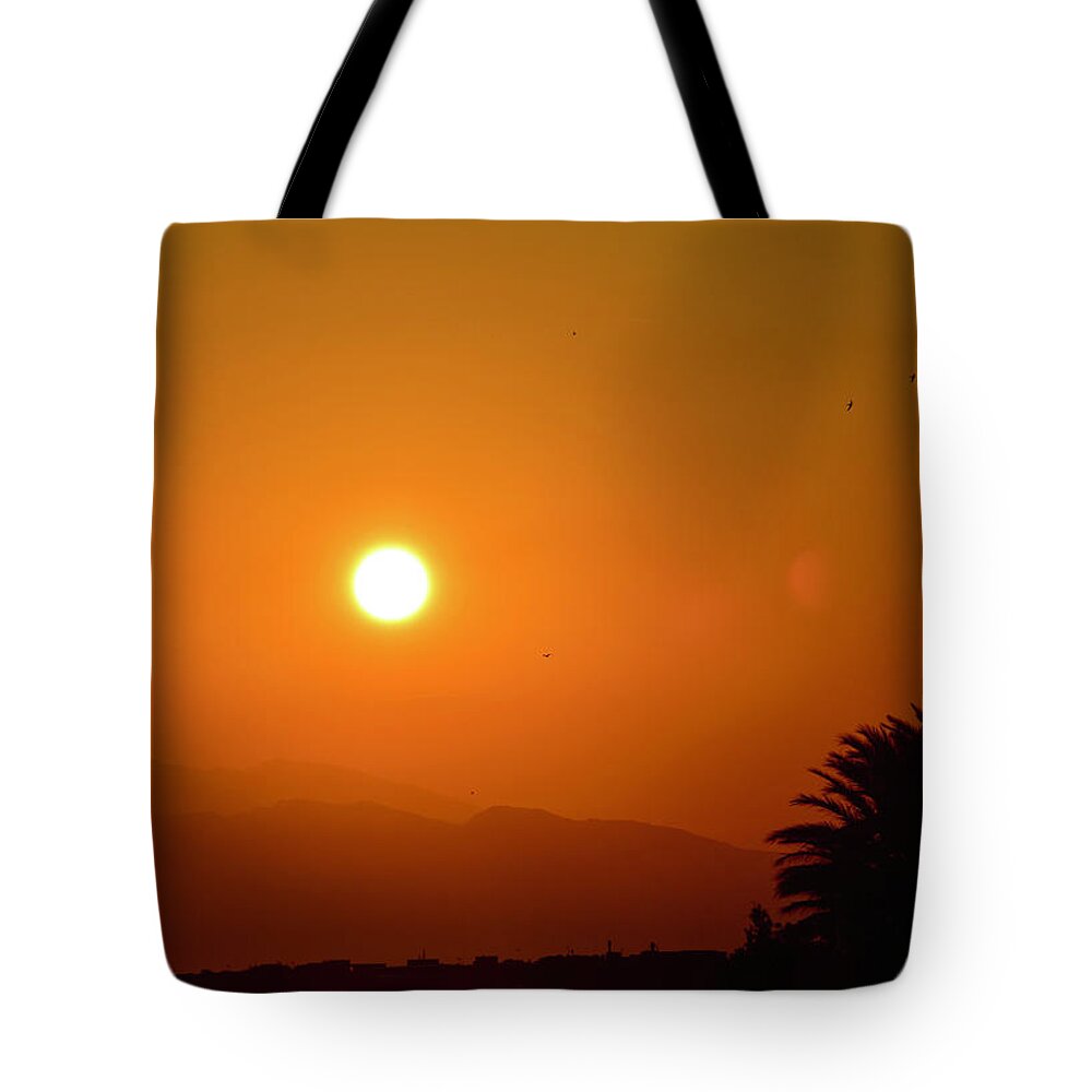 Sunset Tote Bag featuring the photograph Sunset in Roses by Monika Salvan