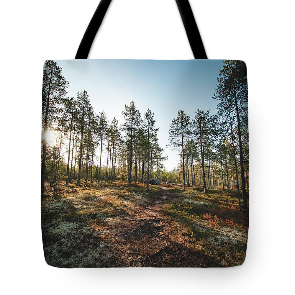 Outside Tote Bag featuring the photograph Sunset in the Finnish wilderness by Vaclav Sonnek