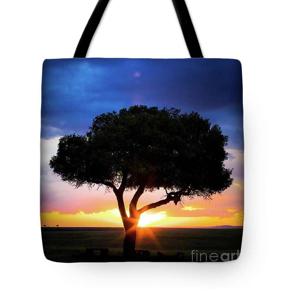 Mara Tote Bag featuring the photograph Sunset in the Masai Mara with tree silhouette by Jane Rix