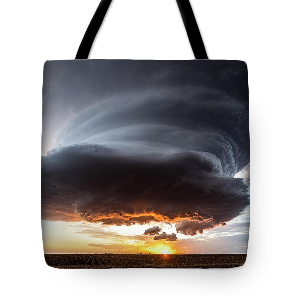 Sunset Tote Bag featuring the photograph Sunset Mothership by Marcus Hustedde