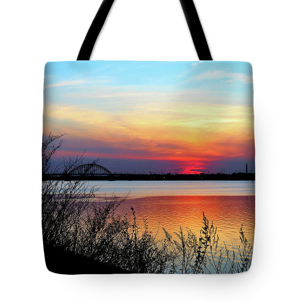 Delaware River Tote Bag featuring the photograph Sunset on the Delaware River With Tacony Palmyra Bridge to Philadelphia by Linda Stern