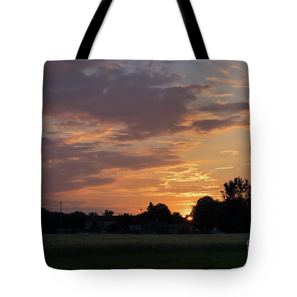 Sunset Tote Bag featuring the photograph Sunset at the edge of the forest 1 by Adriana Mueller