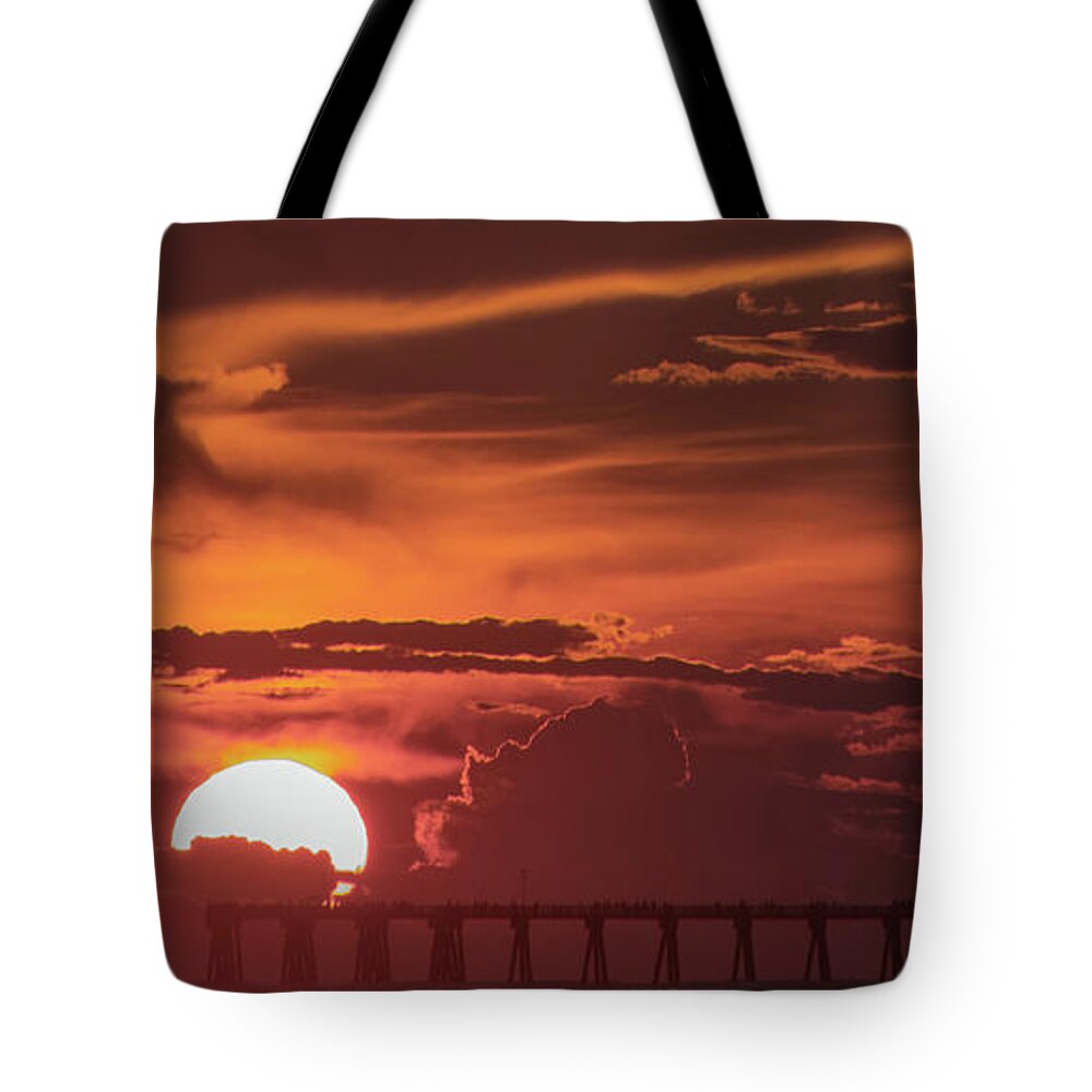 Sunset Tote Bag featuring the photograph Sunset on the pier by Jamie Tyler