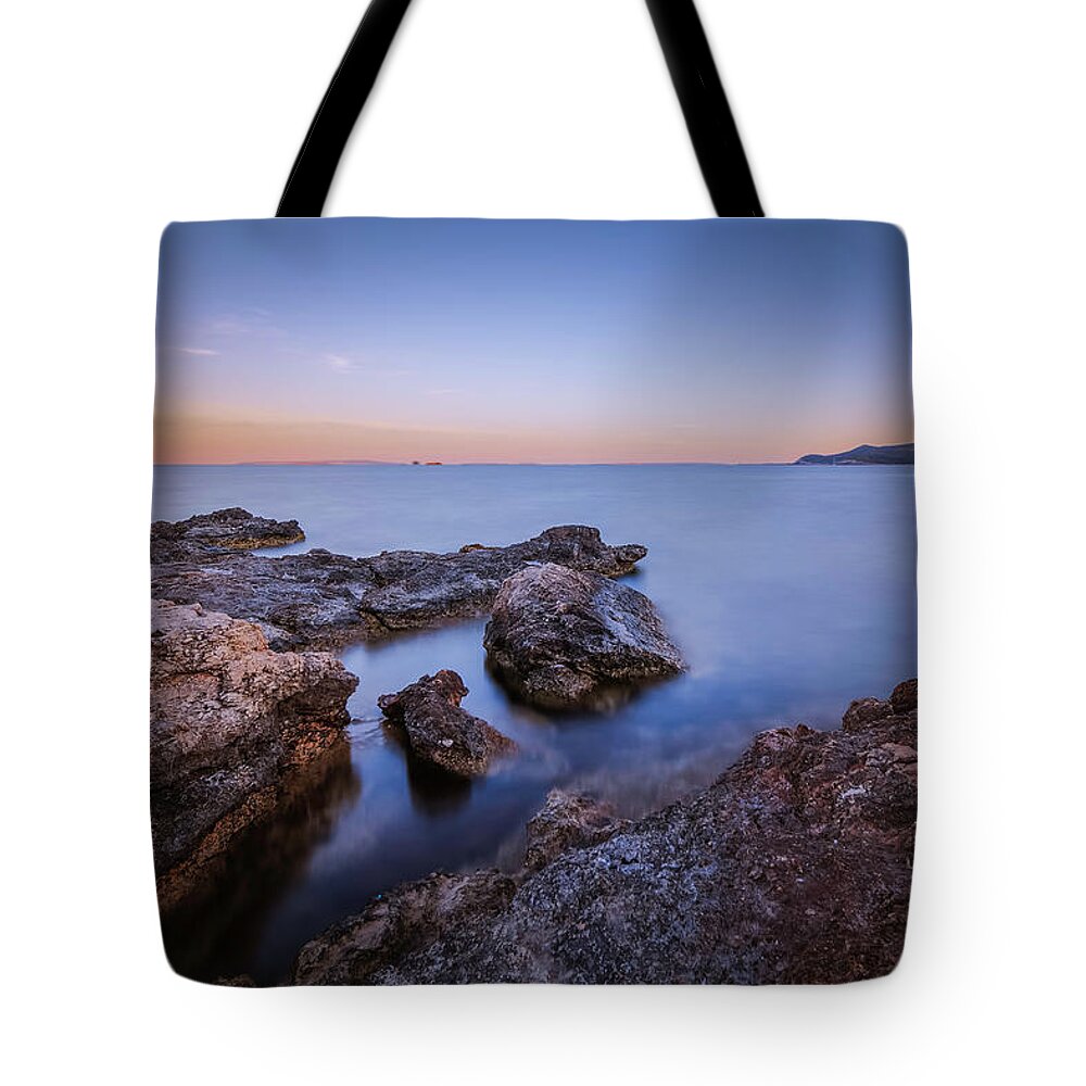 Seascape Tote Bag featuring the photograph Sunset on the Rocks by Rick Deacon