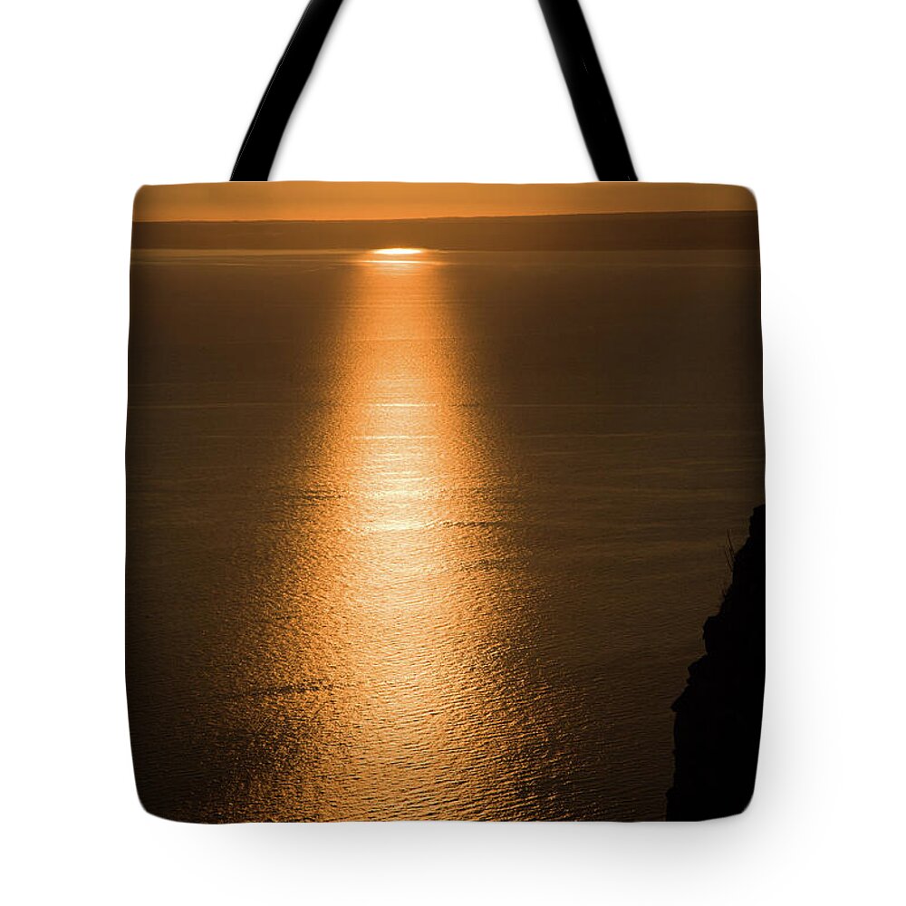 Cres Tote Bag featuring the photograph Sunset over Cres by Ian Middleton