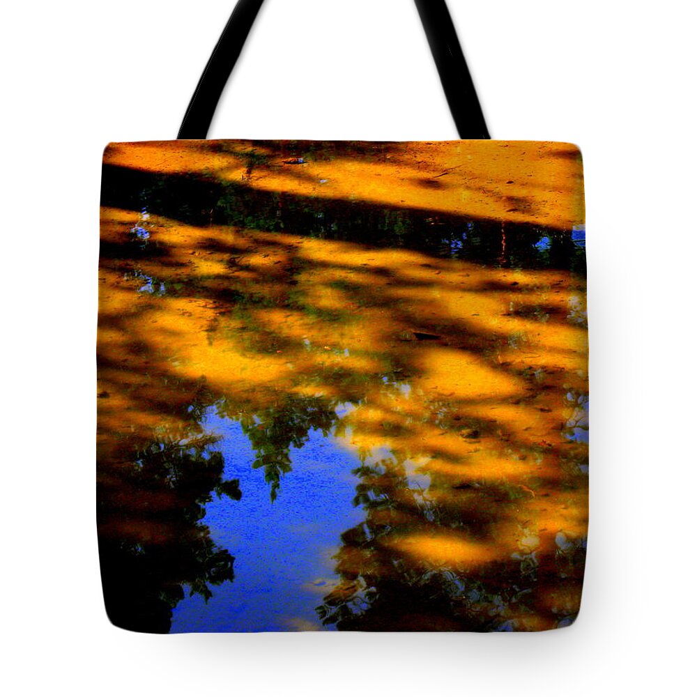 Sunset Tote Bag featuring the photograph Sunset by Pauli Hyvonen