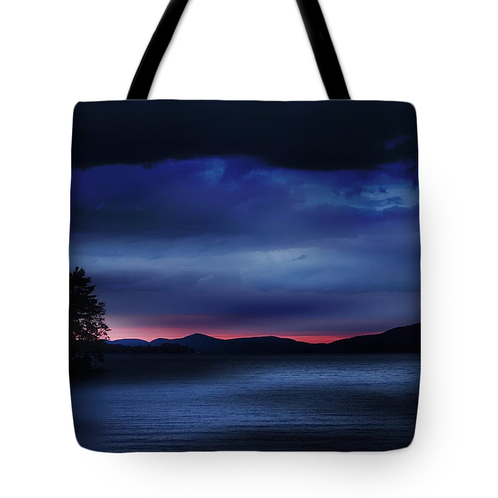 Sun Tote Bag featuring the photograph Sunset Storm Clouds by Russel Considine