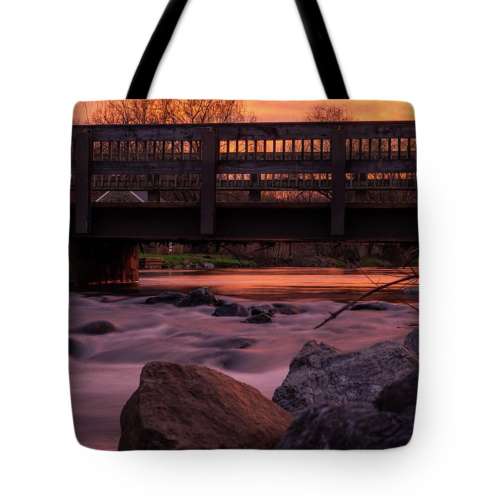 Sunset Tote Bag featuring the photograph Sunset Under the Bridge by Jason Fink