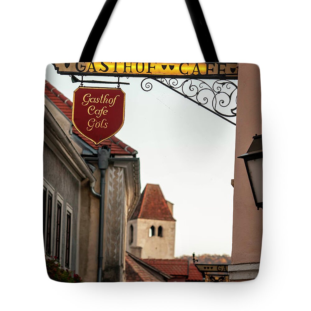  Tote Bag featuring the photograph Sunset Walks In Durnstein. Main Street and Forged Signs 1 by Jenny Rainbow