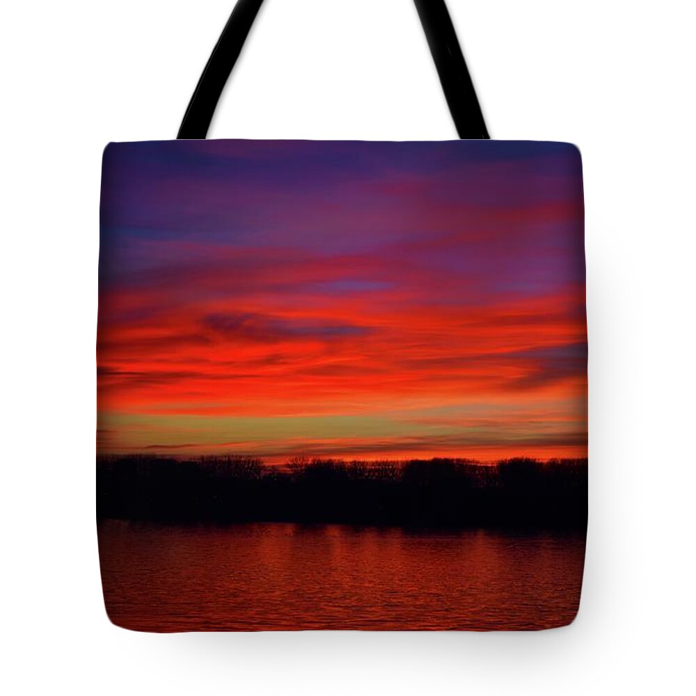 Nature Tote Bag featuring the photograph Sunset With Vermilion Kisses by Leonida Arte