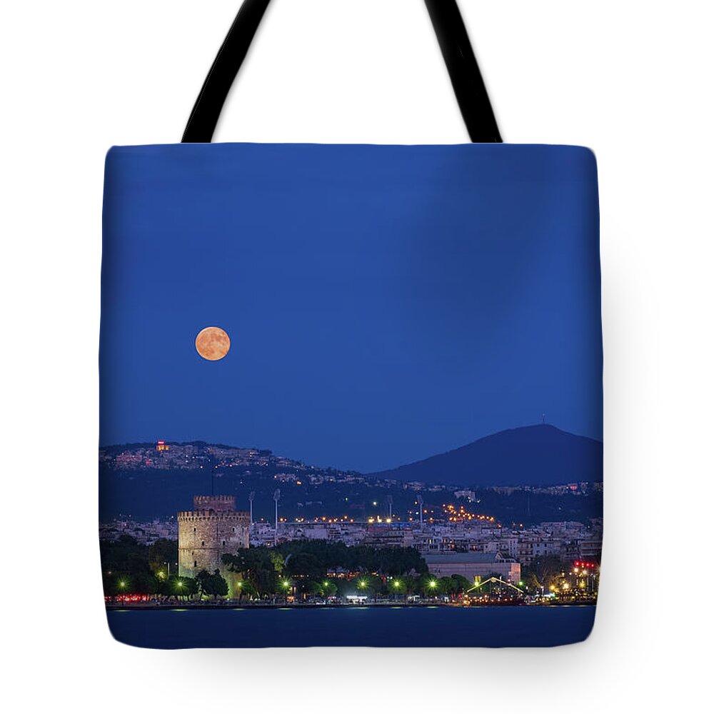 Thessaloniki Tote Bag featuring the photograph Supermoon over the White Tower of Thessaloniki by Alexios Ntounas