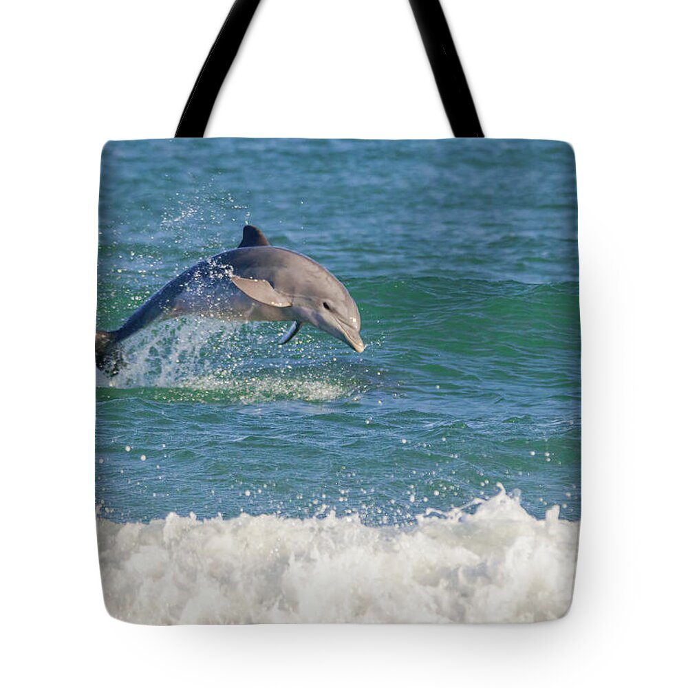 Dolphin Tote Bag featuring the photograph Surf Dolphin by Bradford Martin