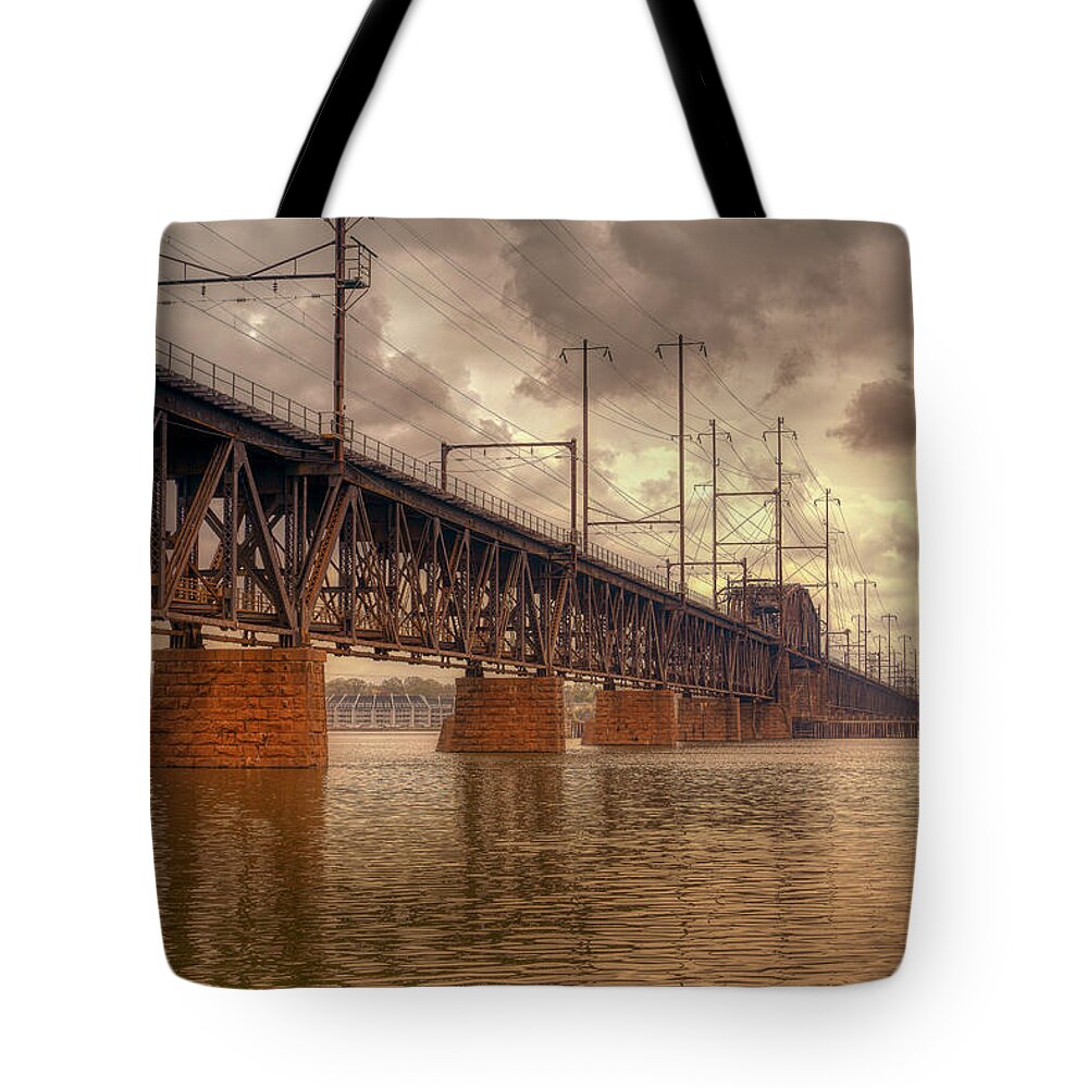 Amtrak Susquehanna River Bridge Tote Bag featuring the photograph Susquehanna Railroad Bridge by Penny Polakoff