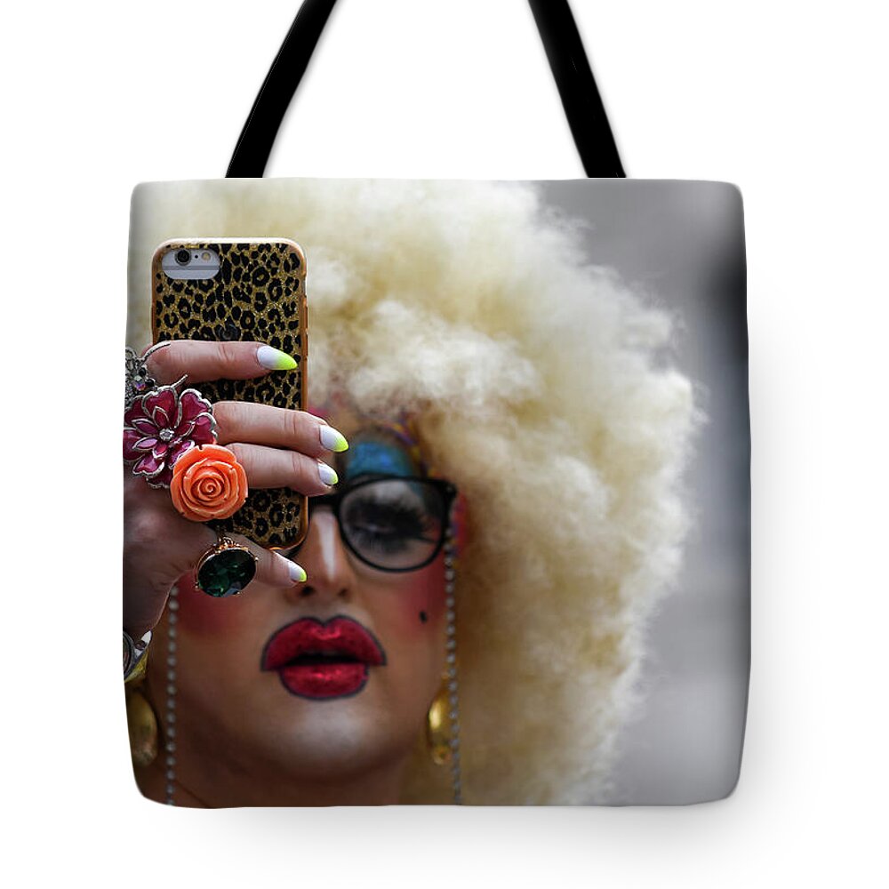 Lgbt Tote Bag featuring the photograph Taking a selfie during Pride in London 2019 by Andrew Lalchan