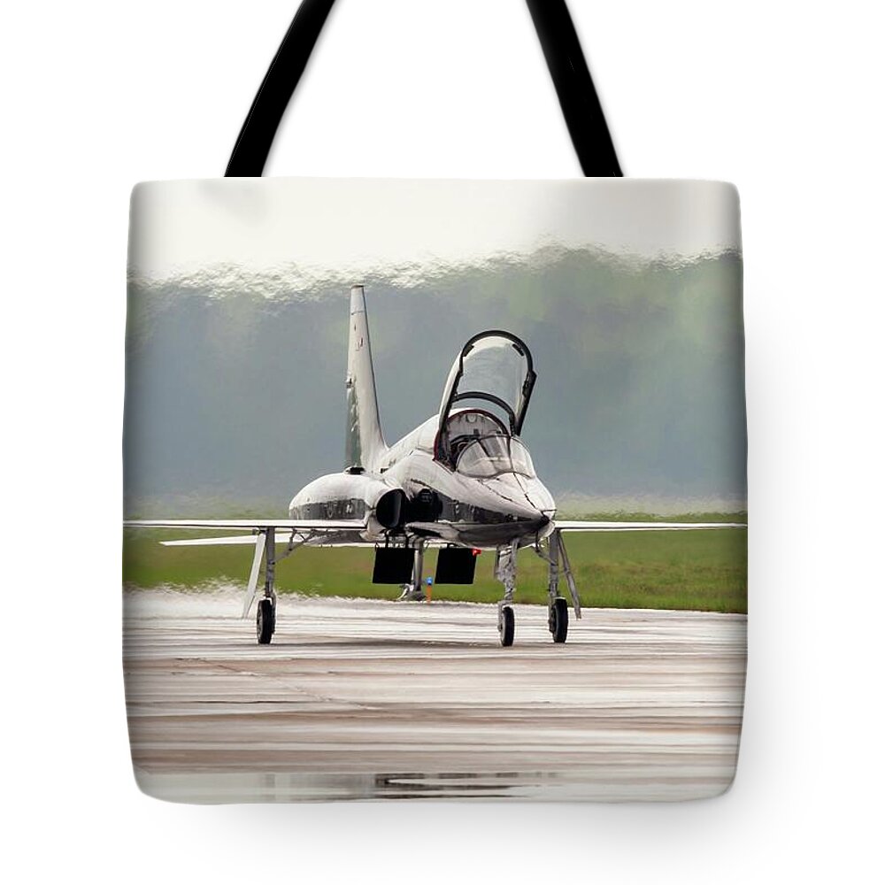 Airplane Tote Bag featuring the photograph Talon Taxi by Liza Eckardt