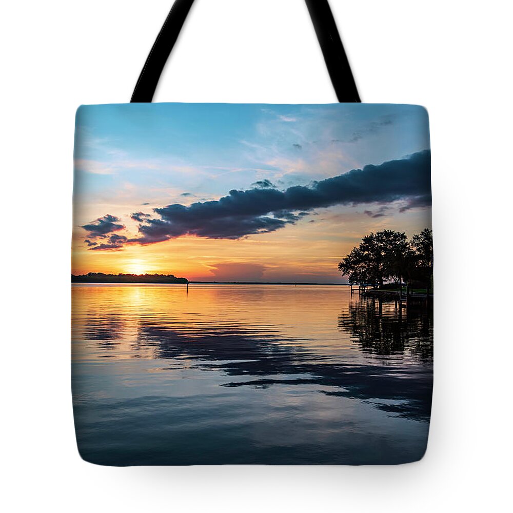 Tampa Bay Tote Bag featuring the photograph Tampa Bay Sunrise by Allen Carroll