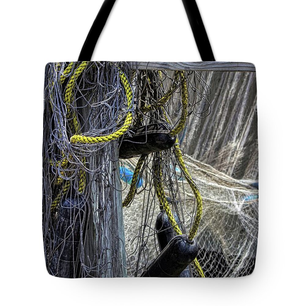 Fishing Tote Bag featuring the photograph Tangeld Fishing Net by Ron Grafe