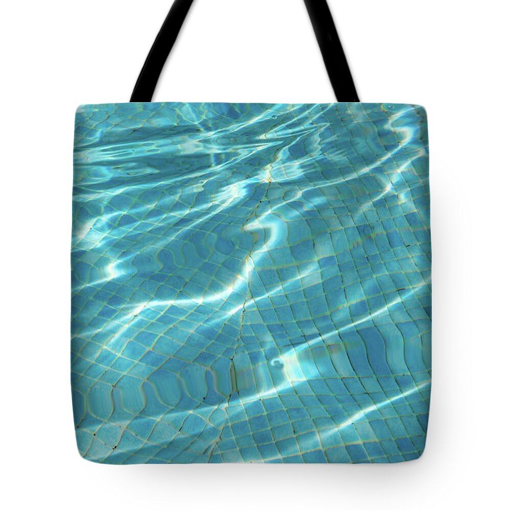 Whimsical Waterworks Tote Bag featuring the photograph Tessellated Layers and Patterns - Sunlit Turquoise Fabstract by Georgia Mizuleva