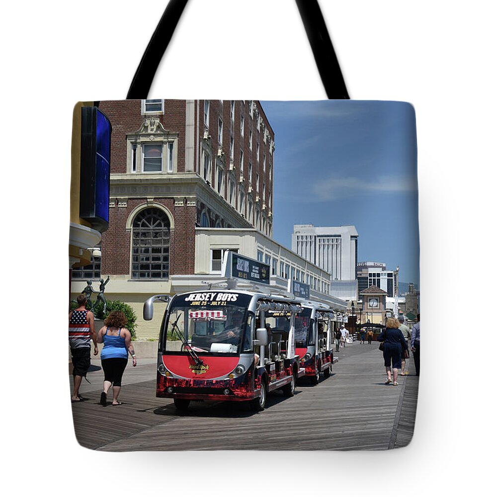 Atlantic City Tote Bag featuring the photograph The Atlantic City Boardwalk by Mark Stout