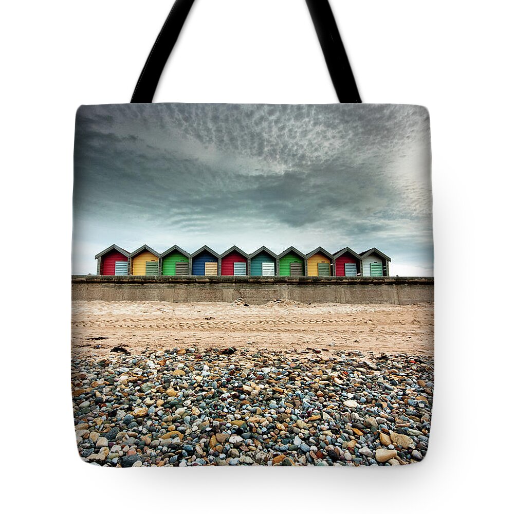 Beach Huts Tote Bag featuring the photograph The Beach Huts by Anita Nicholson