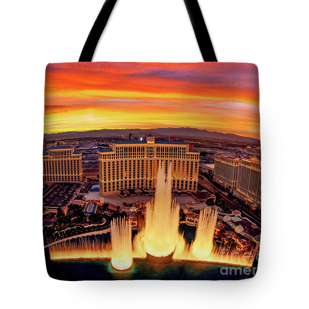 Bellagio Fountains At Sunset Tote Bag featuring the photograph The Bellagio Fountains Bright Warm Cloudy Sunset by Aloha Art