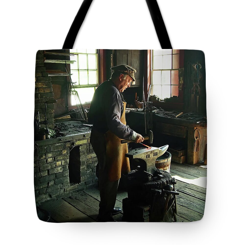 Old Tote Bag featuring the photograph The Blacksmith by Scott Olsen