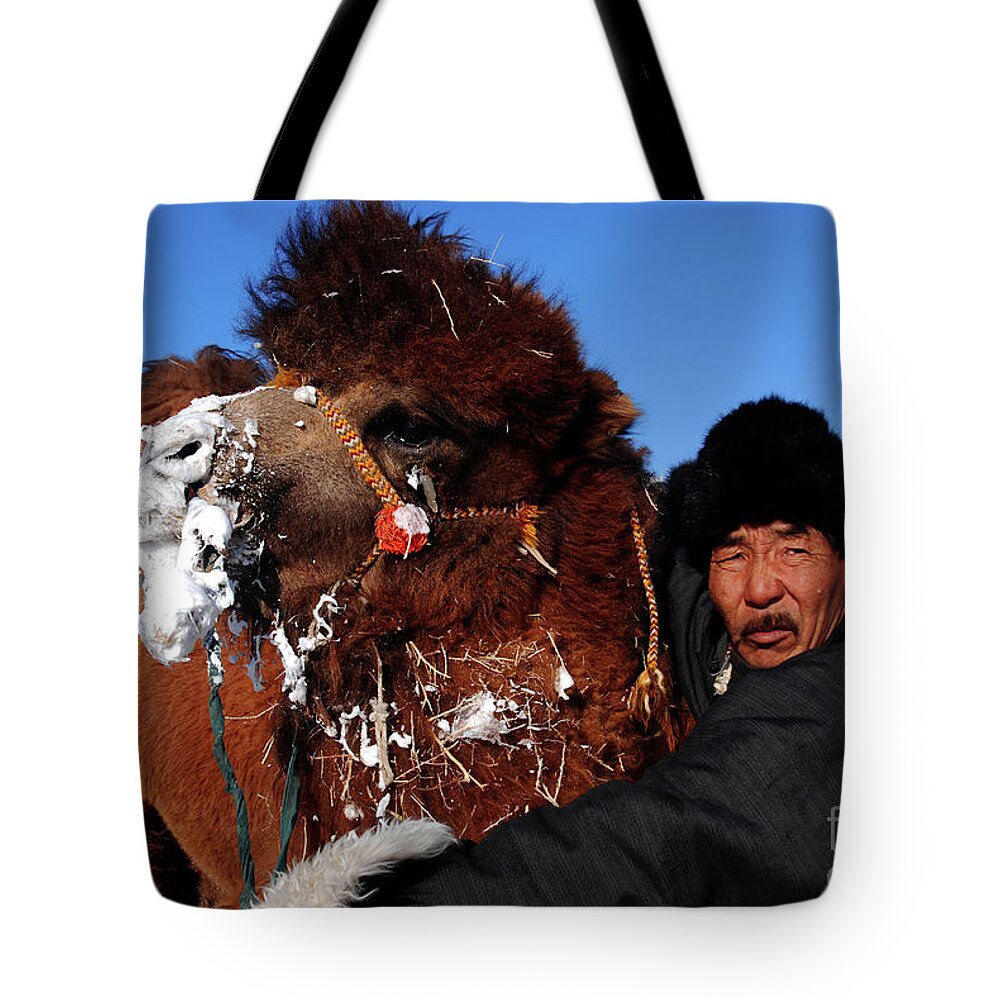 The Camel Has An Owner Tote Bag featuring the photograph The camel has an owner by Elbegzaya Lkhagvasuren
