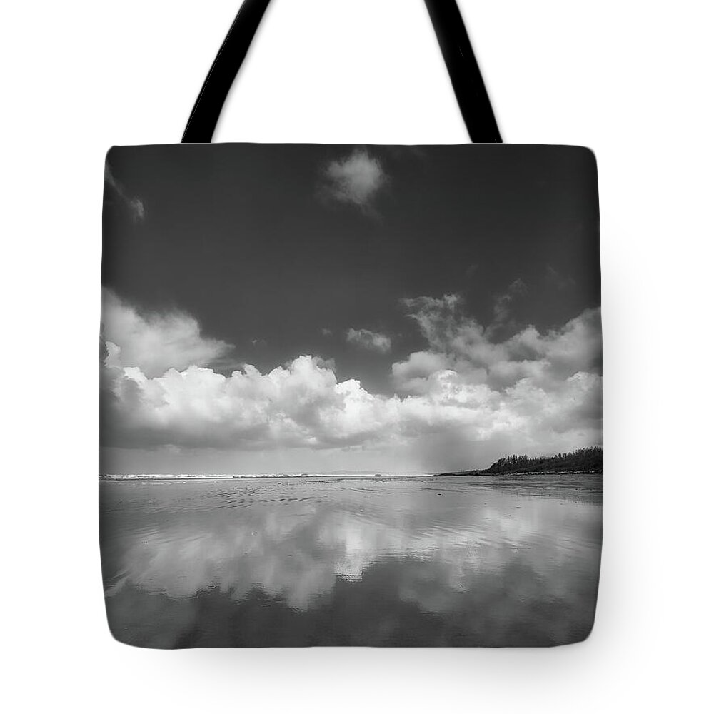 Black And White Photography Tote Bag featuring the photograph The Clouds and the Tide Black and White by Allan Van Gasbeck