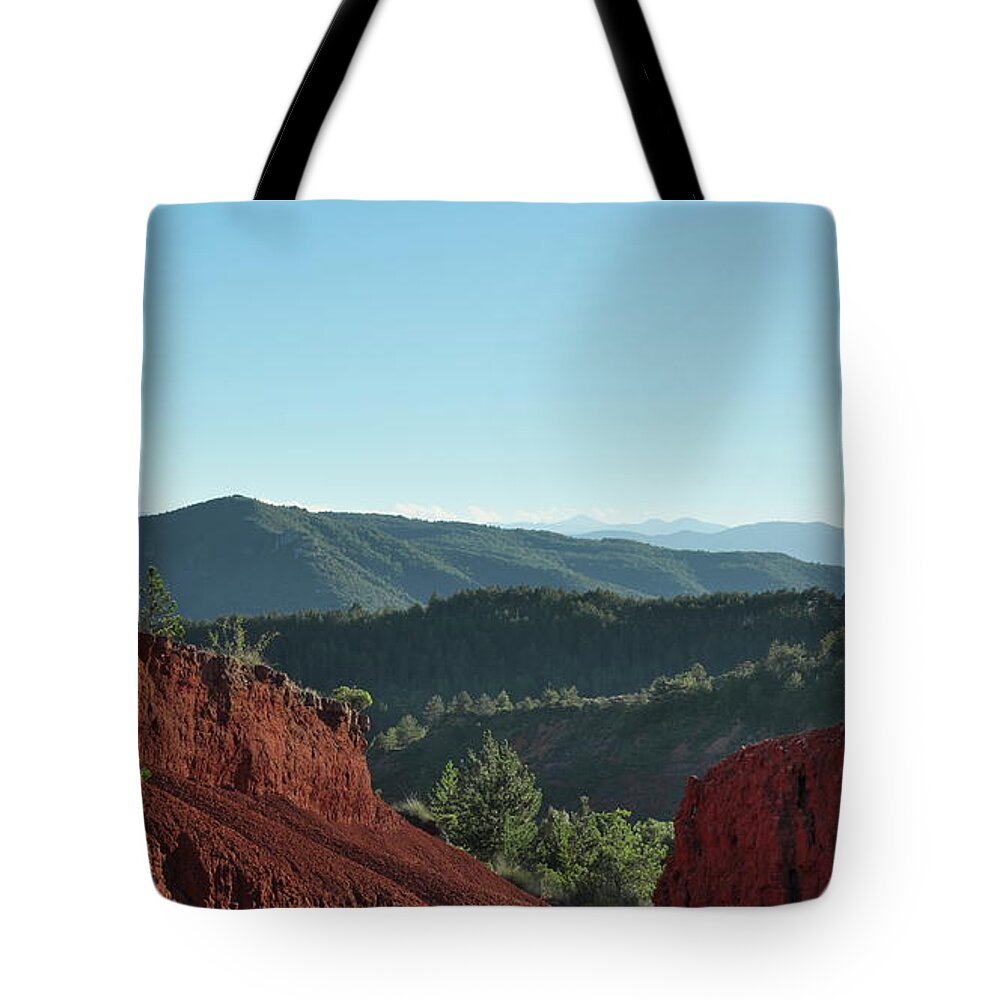 Red Lands Tote Bag featuring the photograph The cradle of Humankind by Karine GADRE