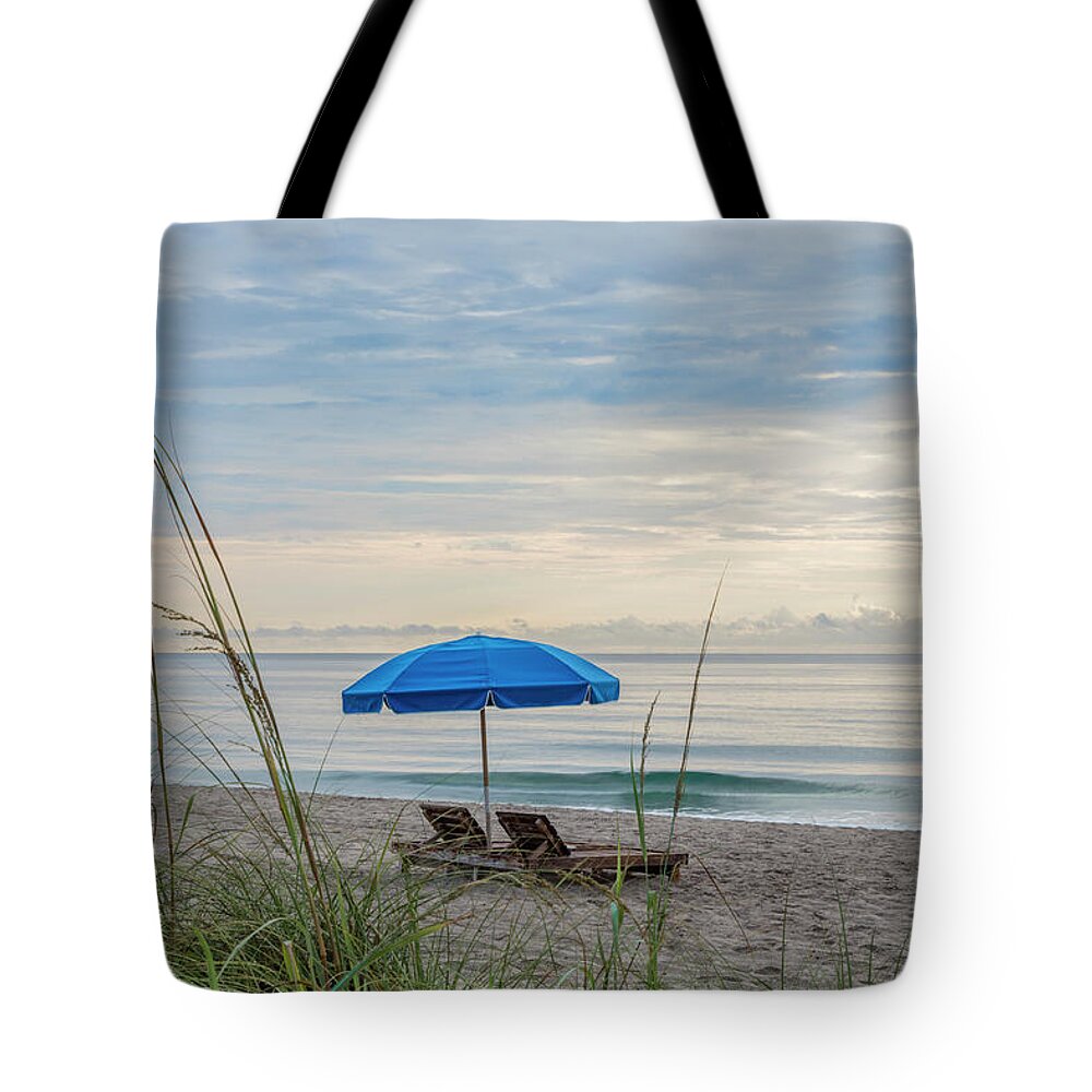 Clouds Tote Bag featuring the photograph The Edge of Paradise by Debra and Dave Vanderlaan