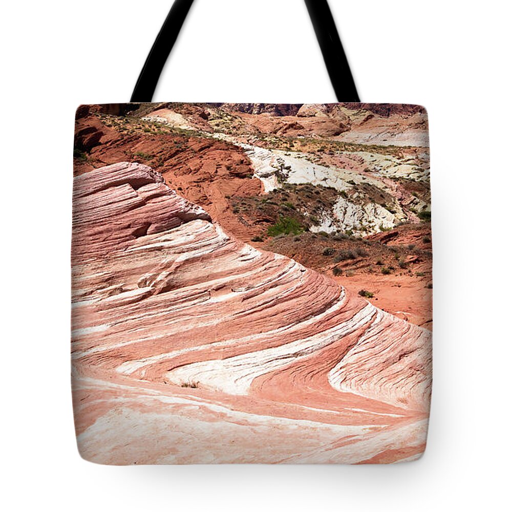 The Wave Tote Bag featuring the photograph The fire wave in valley of Fire State Park by Jean-Luc Farges