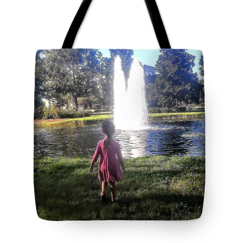 Discovery Tote Bag featuring the photograph The Fountain by Suzanne Berthier