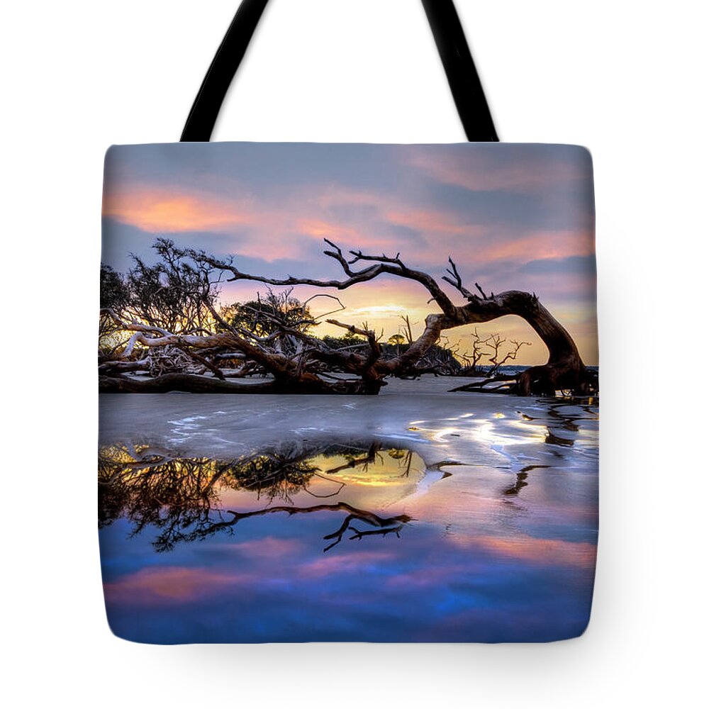 Clouds Tote Bag featuring the photograph The Giant has Fallen Jekyll Island Sunrise by Debra and Dave Vanderlaan