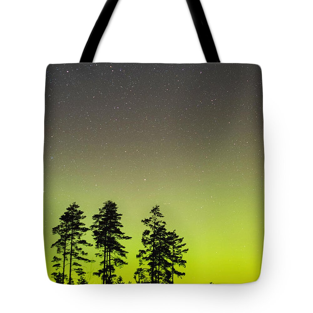 Aurora Tote Bag featuring the photograph The glow of the northern sky by Maria Dimitrova
