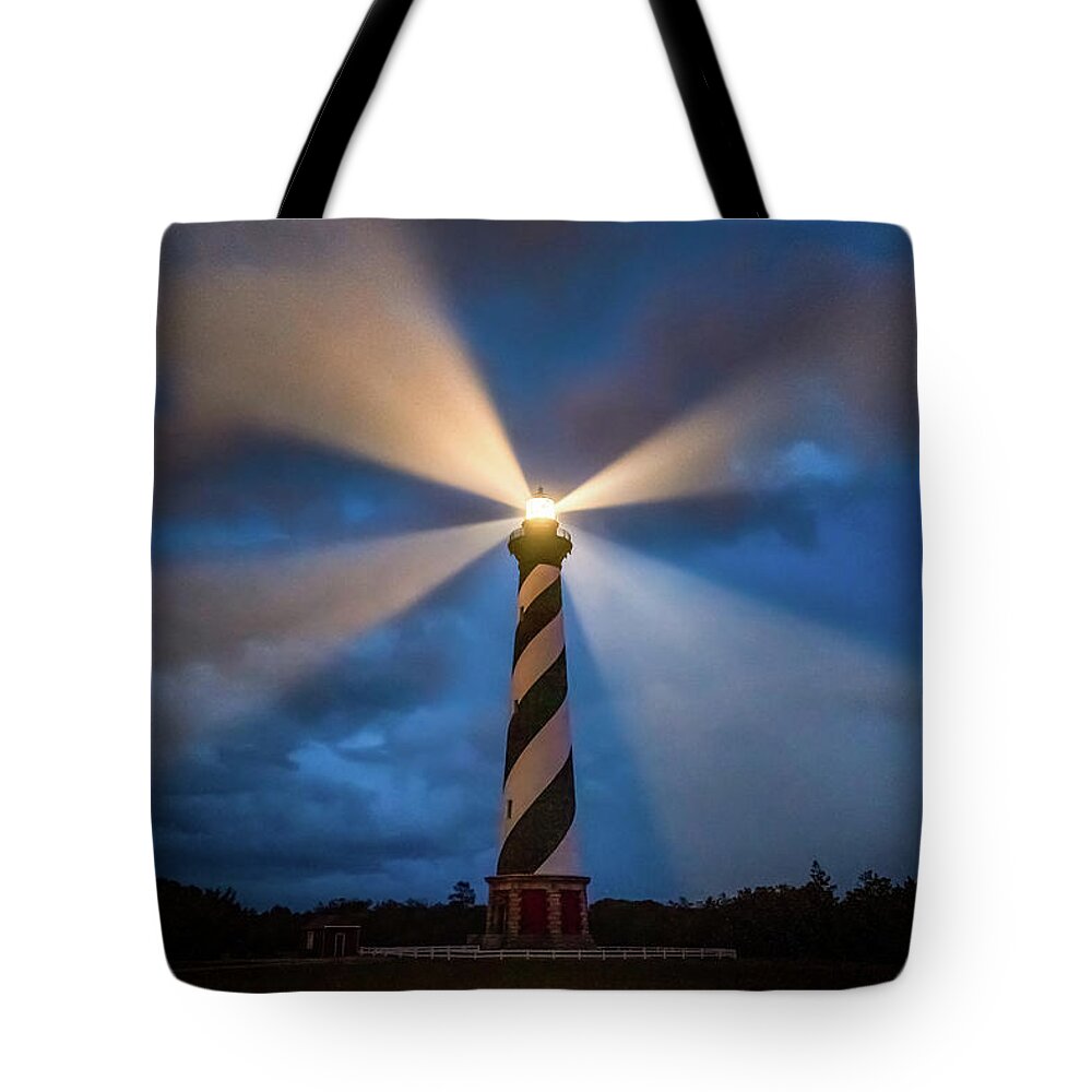 North Carolina Tote Bag featuring the photograph The guiding light by Robert Miller