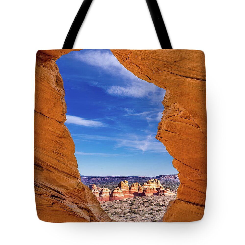 2018 Tote Bag featuring the photograph The Hole in The Rock by Edgars Erglis