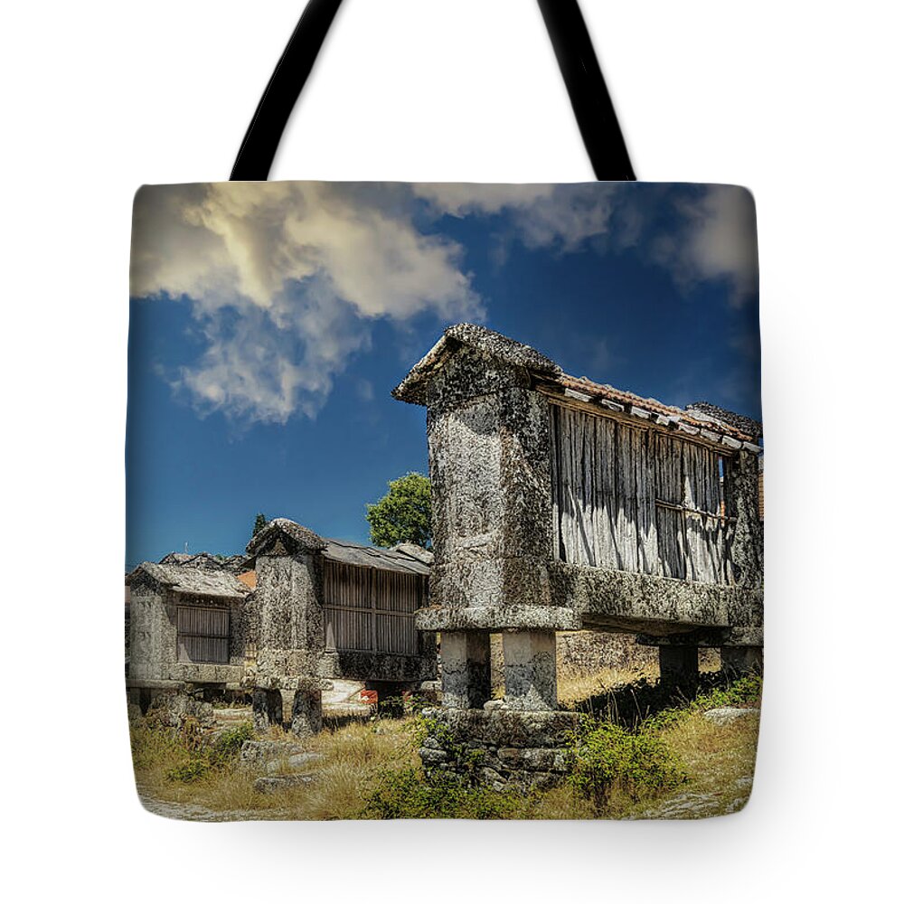 Hórreo Tote Bag featuring the photograph The Horreos of Barreiro by Micah Offman