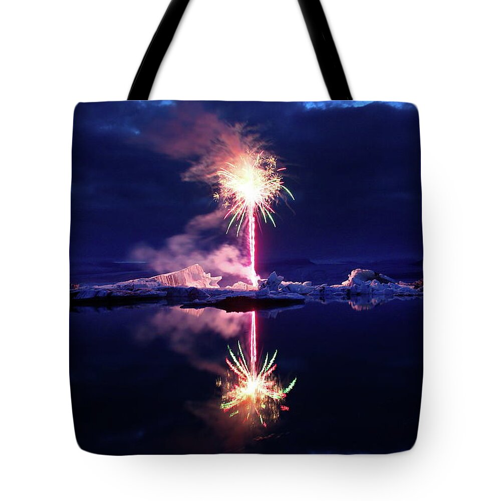 Fireworks Tote Bag featuring the photograph The ice candle by Christopher Mathews