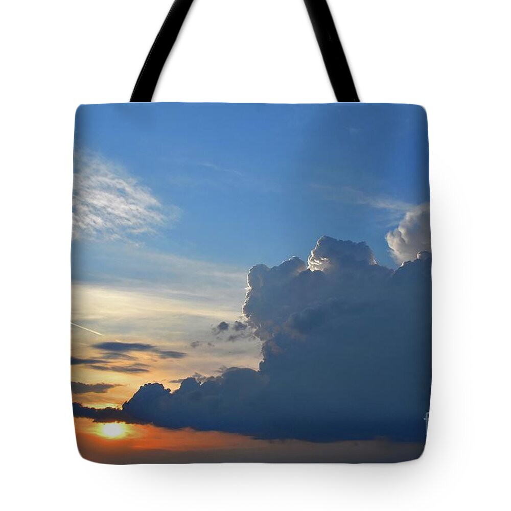 Nature Tote Bag featuring the photograph The Kiss of Sunset and Clouds by Leonida Arte