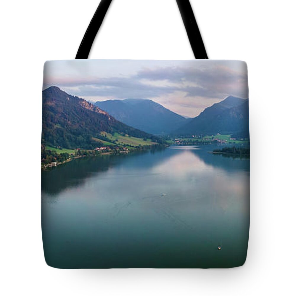 Alps Tote Bag featuring the photograph The lake and the Alps by Hannes Cmarits
