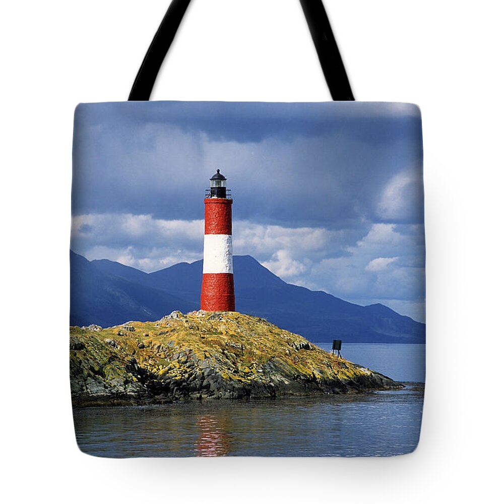 Lighthouse Tote Bag featuring the photograph The Lighthouse at the End of the World by James Brunker