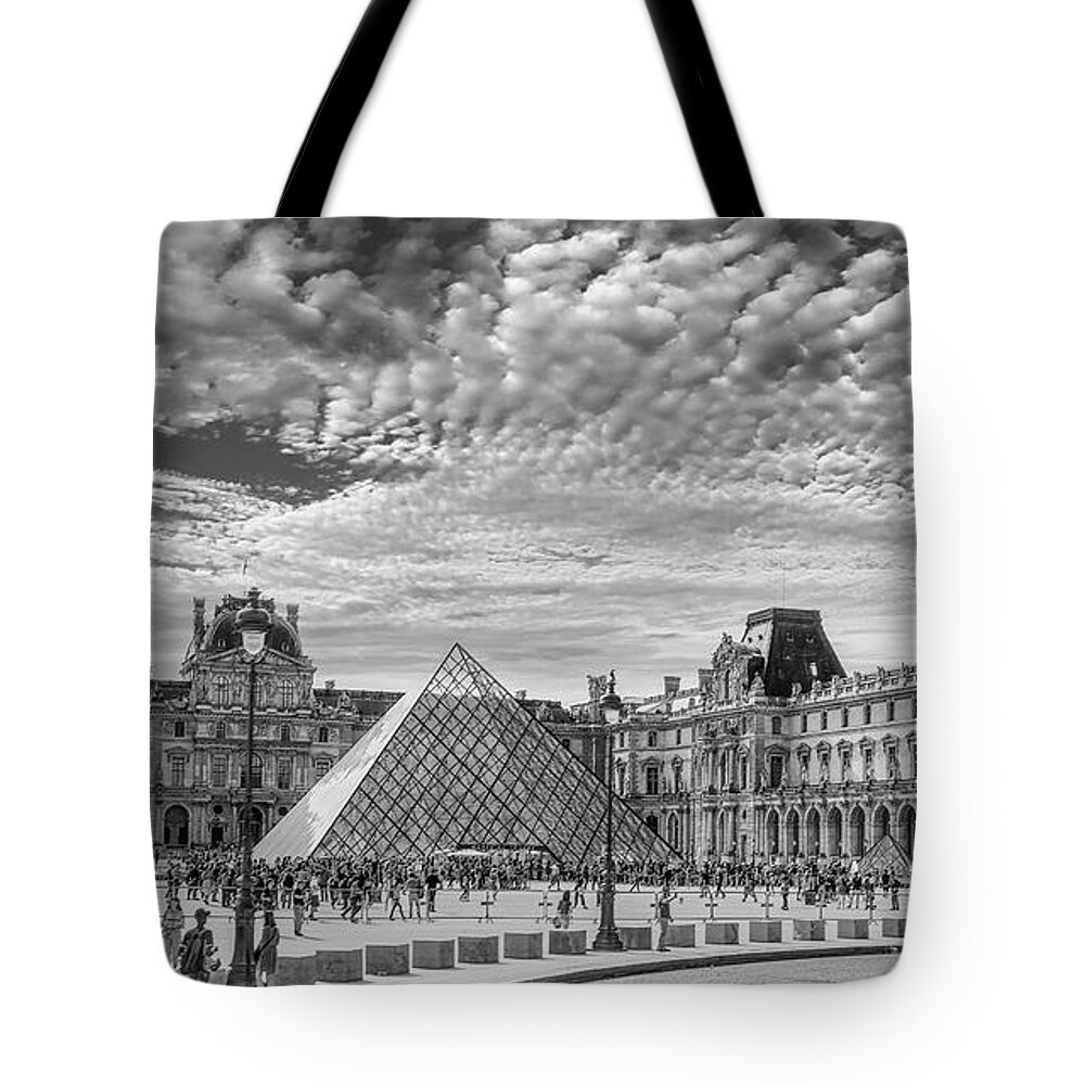 Louvre Pyramid Tote Bag featuring the photograph The Louvre, A Black and White Panorama by Marcy Wielfaert