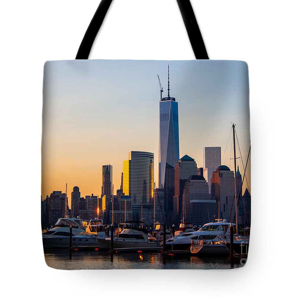 Skyline Tote Bag featuring the photograph The Manhattan Skyline at Sunset by L Bosco
