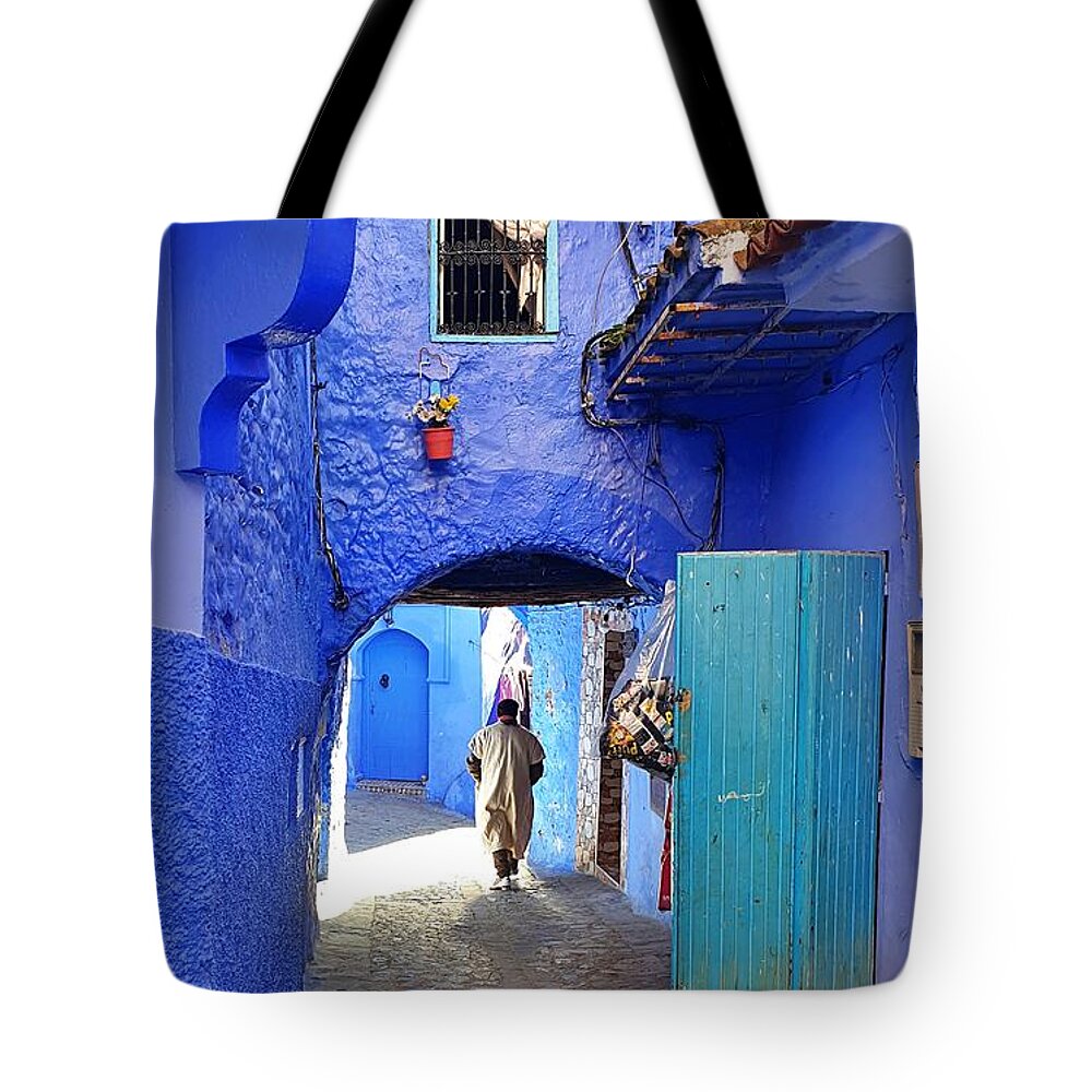 Tunnel Tote Bag featuring the photograph The Mystery Man by Andrea Whitaker