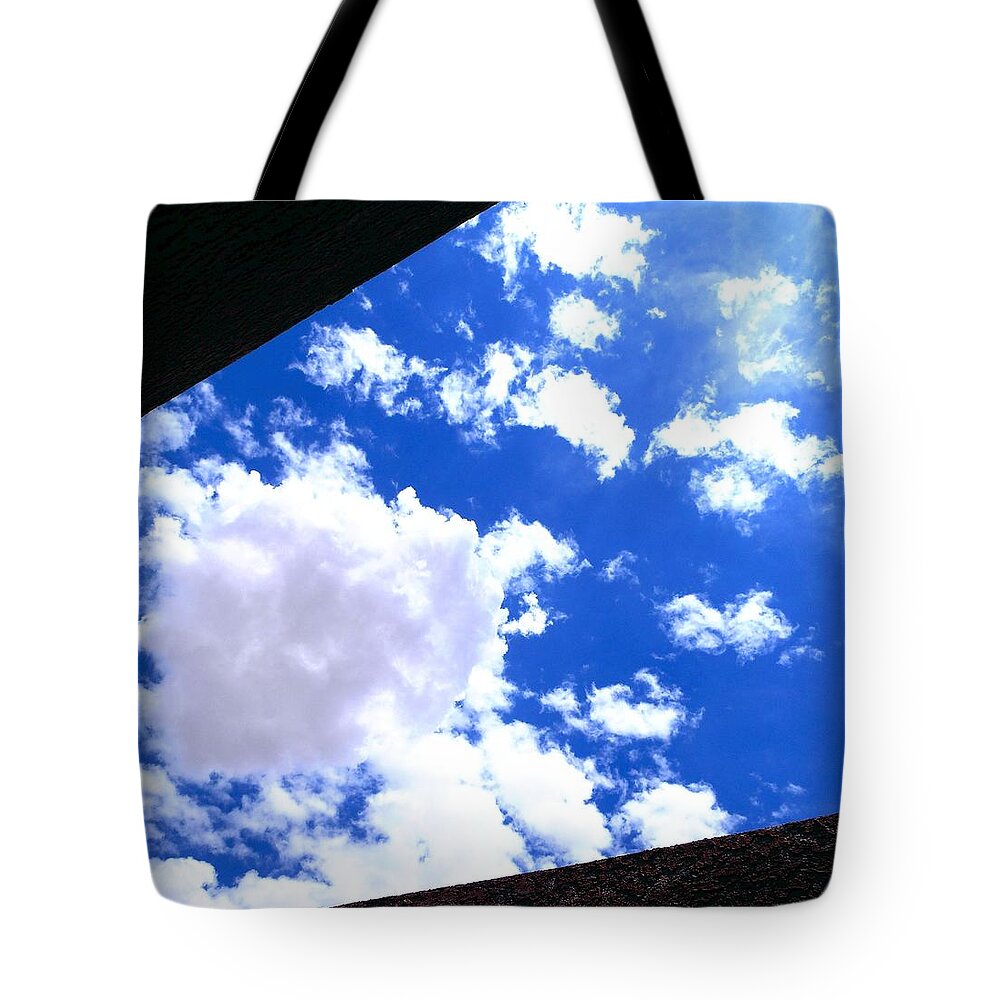 Clouds Tote Bag featuring the photograph The Opening Square by Dietmar Scherf