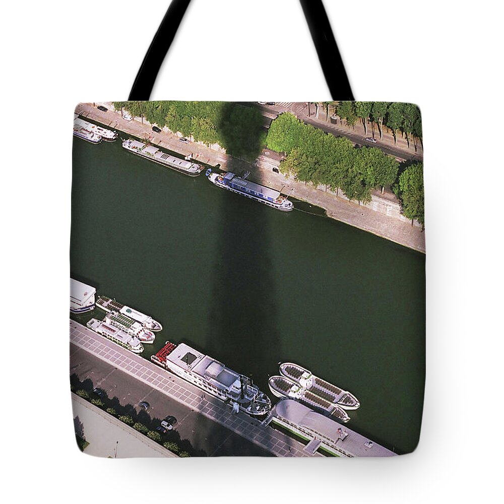 France Tote Bag featuring the photograph The Shadow of the Tower by Jim Feldman